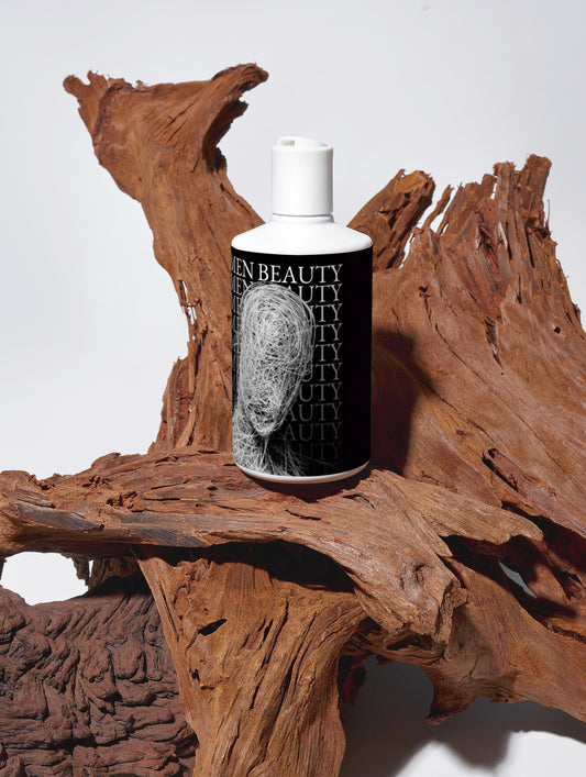 Bottle of Given Beauty product on a wooden surface, Volumize Shampoo.