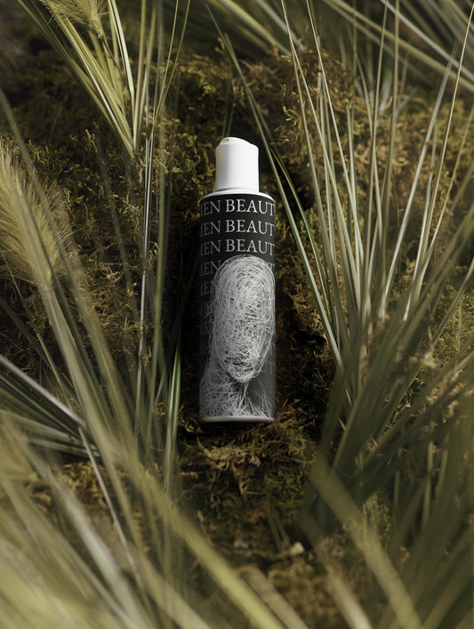 Skincare bottle with 'MEN BEAUTY' branding on a natural background, Hydrating Toner.