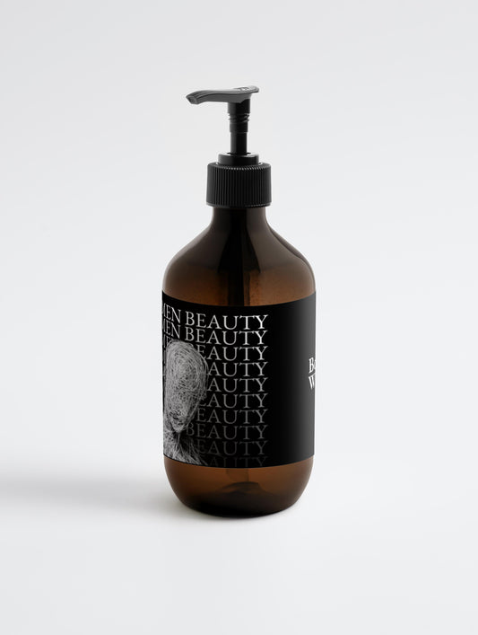 Brown bottle with black pump and label on a white background, Body Wash