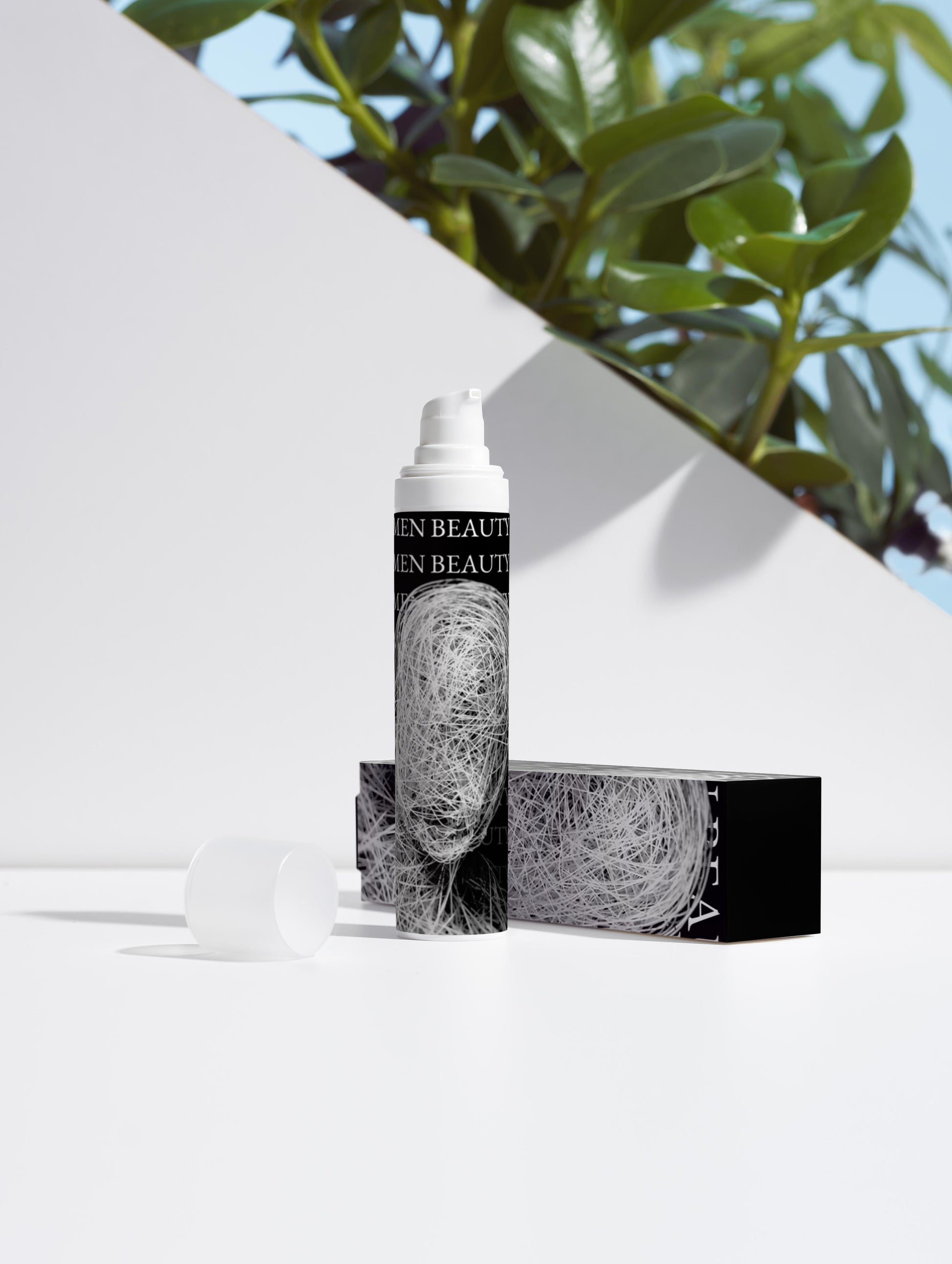 Skincare bottle and packaging with greenery in the background Niacinamide Gel.