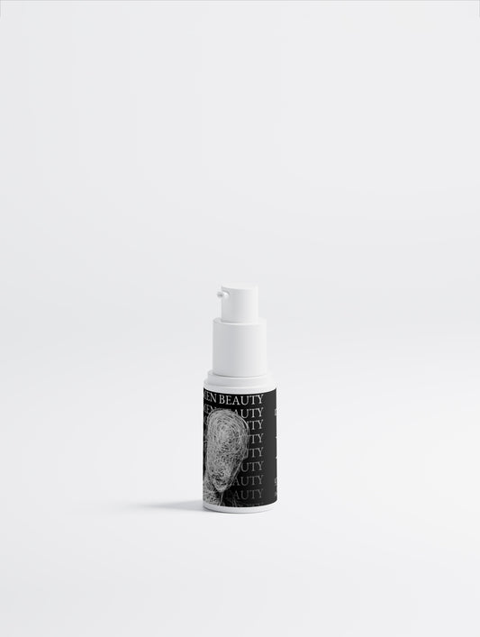 Skincare bottle with label on a white background, Dark Spot Care.