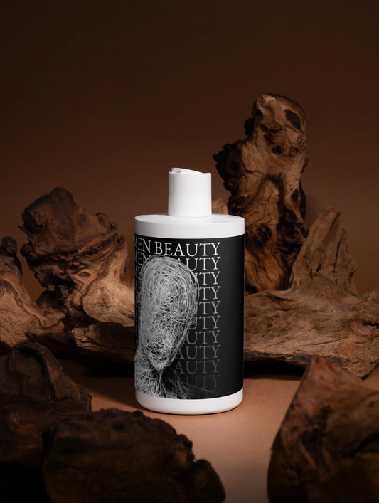 White cylindrical container with black label featuring a face design, placed on a brown surface with wooden elements, Fresh Conditioner.